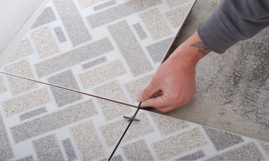 How to pair statement tiles with elegant dining furniture for a cohesive look