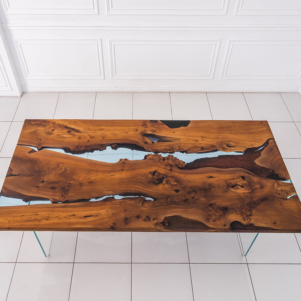 Art Pear Tree Dining Table, Rectangular, Filled With Polymer Resin, MHM009 Brand: Maxima House, Size: 104inW x 43.3inD x 29.5inH, Weight: 355lb Shape: Rectangular, Material: Top: Solid Pear Tree Wood filled with Polymer Resin Legs: Tempered Glass, Seating Capacity: Seats 8-10 people, Color: Natural Wood Color