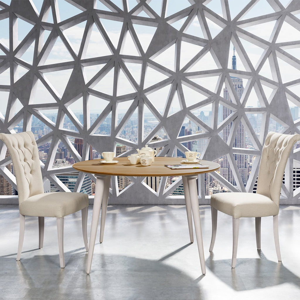 Maxima House Badi Dining Table with classic wood carvings and buttermilk white legs.