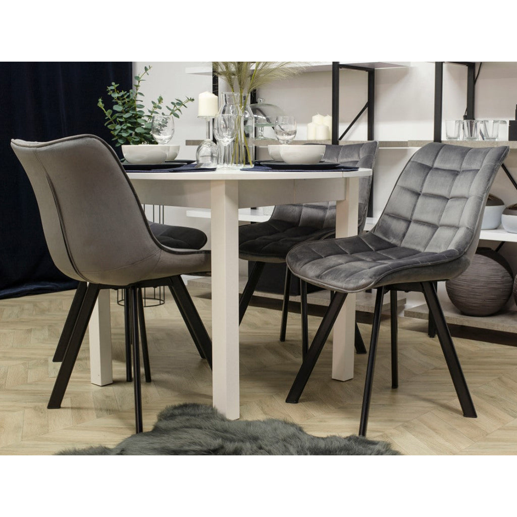 Upholstered dining chairs in gray fabric with powder-coated steel legs
