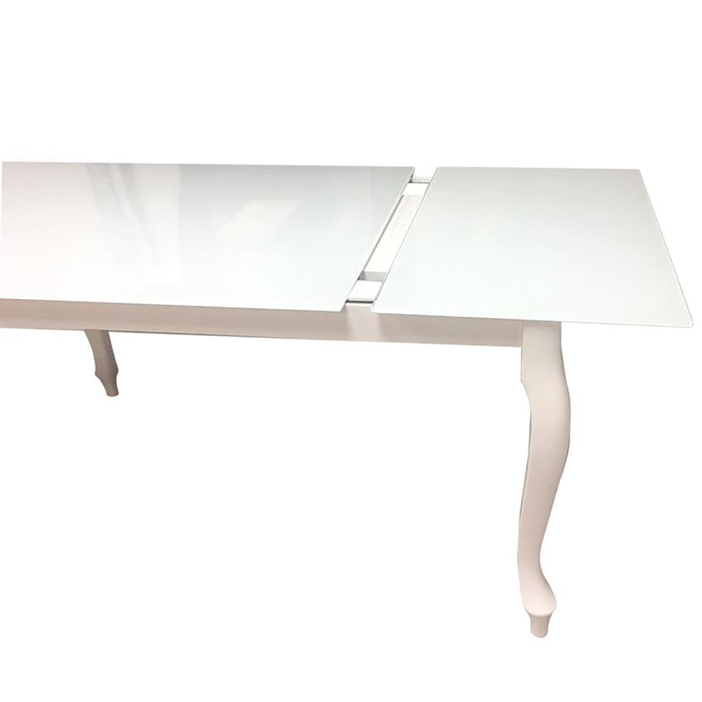 Retro | White 6 Seater Extendable Dining Table, Rectangular, Glass Top, Beech Wood Base, DT0014, Brand: Maxima House Size: 55.1inW x 31.5inD x 30inH, Extended: 74.8inW x 31.5inD x 30inH Weight: 123.5lb, Shape: Rectangular, Material: Top: Glass, Base: Beech Wood, Seating Capacity: Seats 4-6 people, Color: White