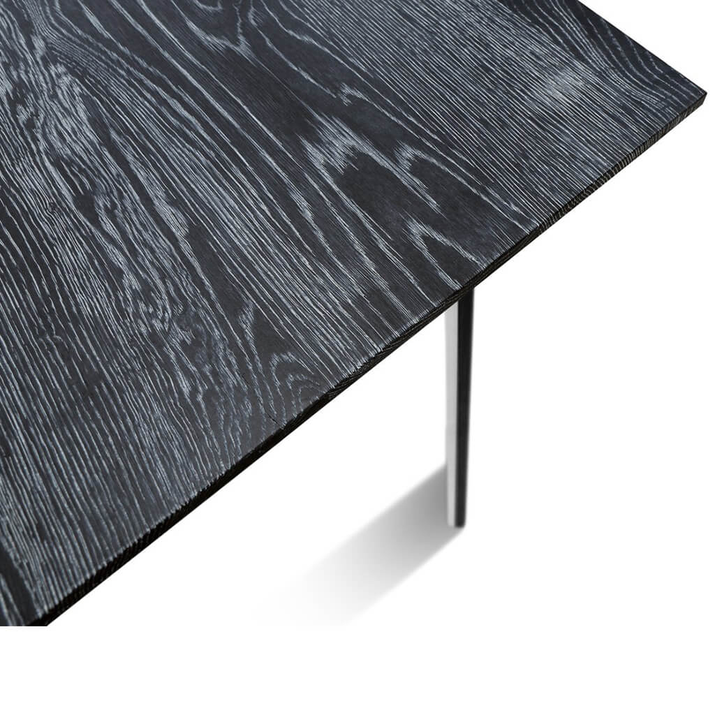Maxima House Kasako Dining Table with modern black and white design, accommodating up to six people.
