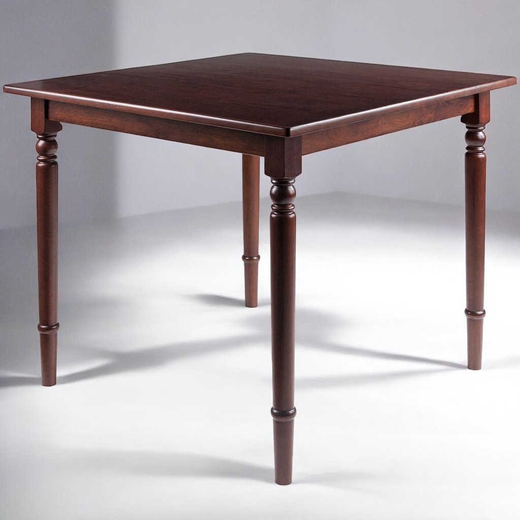 Square walnut wood dining table with turned legs and rounded corners, perfect for small dining areas.