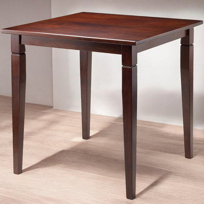 Square walnut wood dining table with tapered legs and a warm walnut finish, perfect for small spaces.