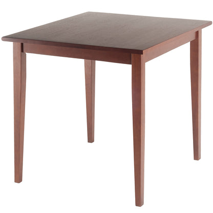 Square walnut wood dining table with shaker legs and a rich walnut finish, ideal for compact spaces.