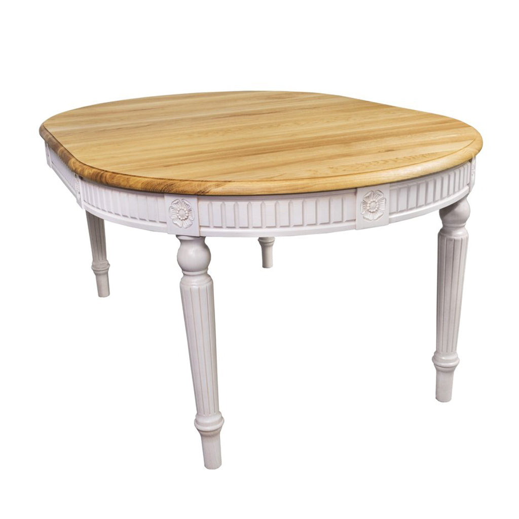 Maxima House Badi Dining Table with handcrafted wood details, warm wood stain top, and buttermilk white legs.