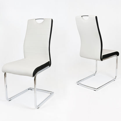 White and black dining chairs with faux leather upholstery and chrome steel legs