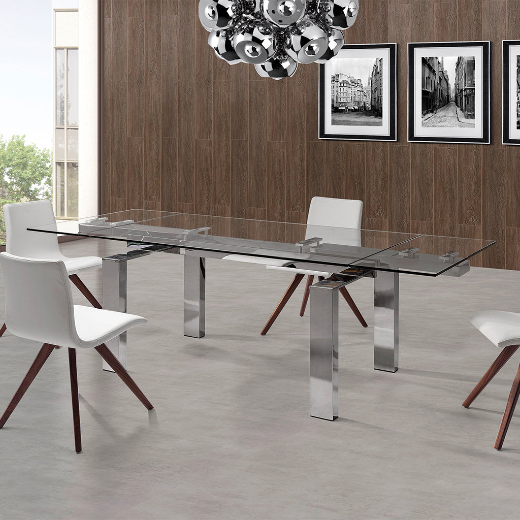 Cuatro | Extendable Rectangular Dining Table, Tempered Glass Table Top, Stainless Steel Base, DT1234  Brand: Whiteline Modern Living  Size: 63inW x 35inD x 30inH; Extended: 98inW x 35inD x 30inH Weight: 272lb, Shape: Rectangular Material: Top: 1/2" Tempered Clear Glass, Aluminum plates, Base: Stainless Steel;  Seating Capacity: Seats 6-8 people; Color: Stainless Steel Color