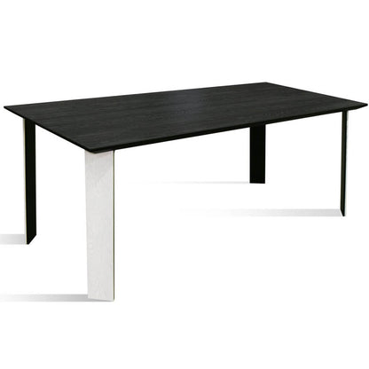 Maxima House Kasako-BW Dining Table featuring a black tabletop and white legs, showcasing a modern and elegant design.