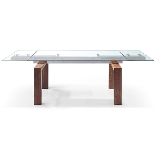 Davy | Rectangular Glass Dining Table With Wooden Legs For 6, DT1256-WLT Brand: Whiteline Modern Living Size: 63inW x 35inD x 30inH; Extended: 98inW x 35inD x 30inH Weight: 235lb, Shape: Rectangular Material: Top: 1/2" Tempered Clear Glass; Base: Solid Wood/ Walnut Veneer Seating Capacity: Seats 4-6 people; Color: Stainless Steel Color