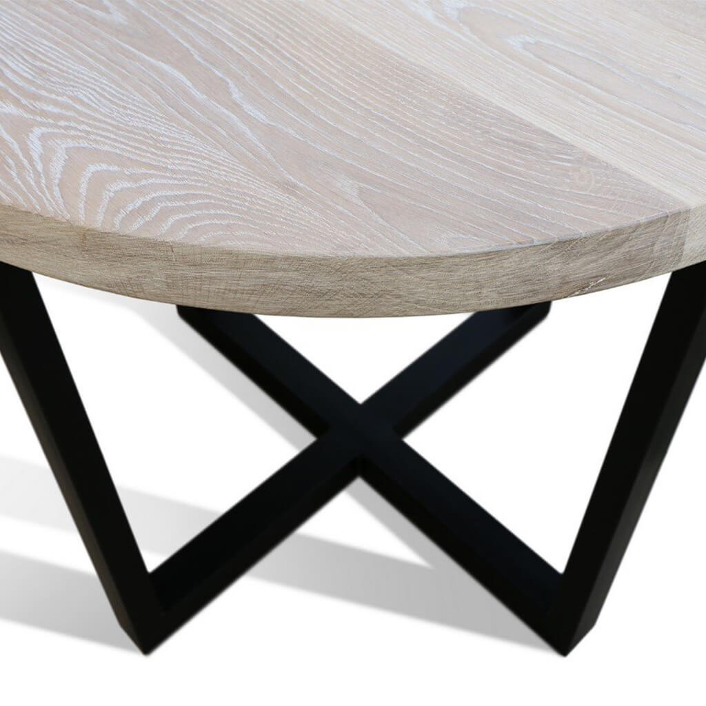 Maxima House Rounda U2 dining table with a modern oak wooden top and black metal base.