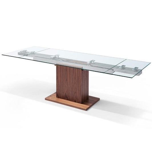 Whiteline Modern Living Pilastro | Extendable Glass Dining Table, Rectangular, 8 seater, 1/2" Tempered Clear Glass Top, Stainless Steel Frame, Walnut Veneer Base, DT1275-WLT Size: 63inW x 35inD x 30inH Extended: 95inW x 35inD x 30inH; Weight: 255lb; Shape: Rectangular Material: Top: 1/2" Tempered Clear Glass; Frame: Stainless Steel; Base: Walnut veneer  Seating Capacity: Seats 6-8 people; Color: Walnut Veneer Color