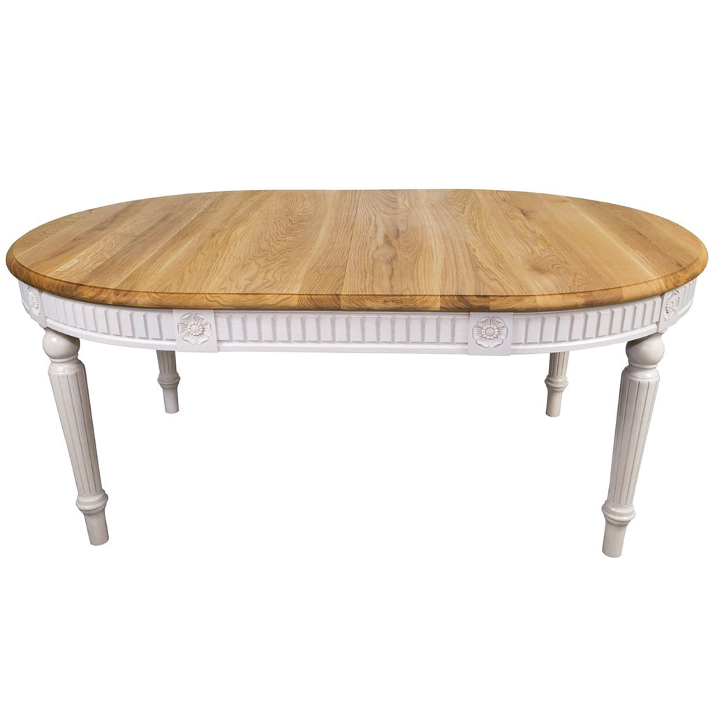 Maxima House Badi Dining Table with handcrafted wood details, warm wood stain top, and buttermilk white legs.