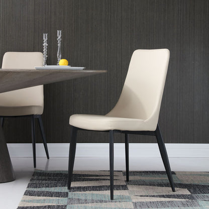 Whiteline Modern Living Luca Dining Chair with taupe faux leather upholstery and black metal legs.