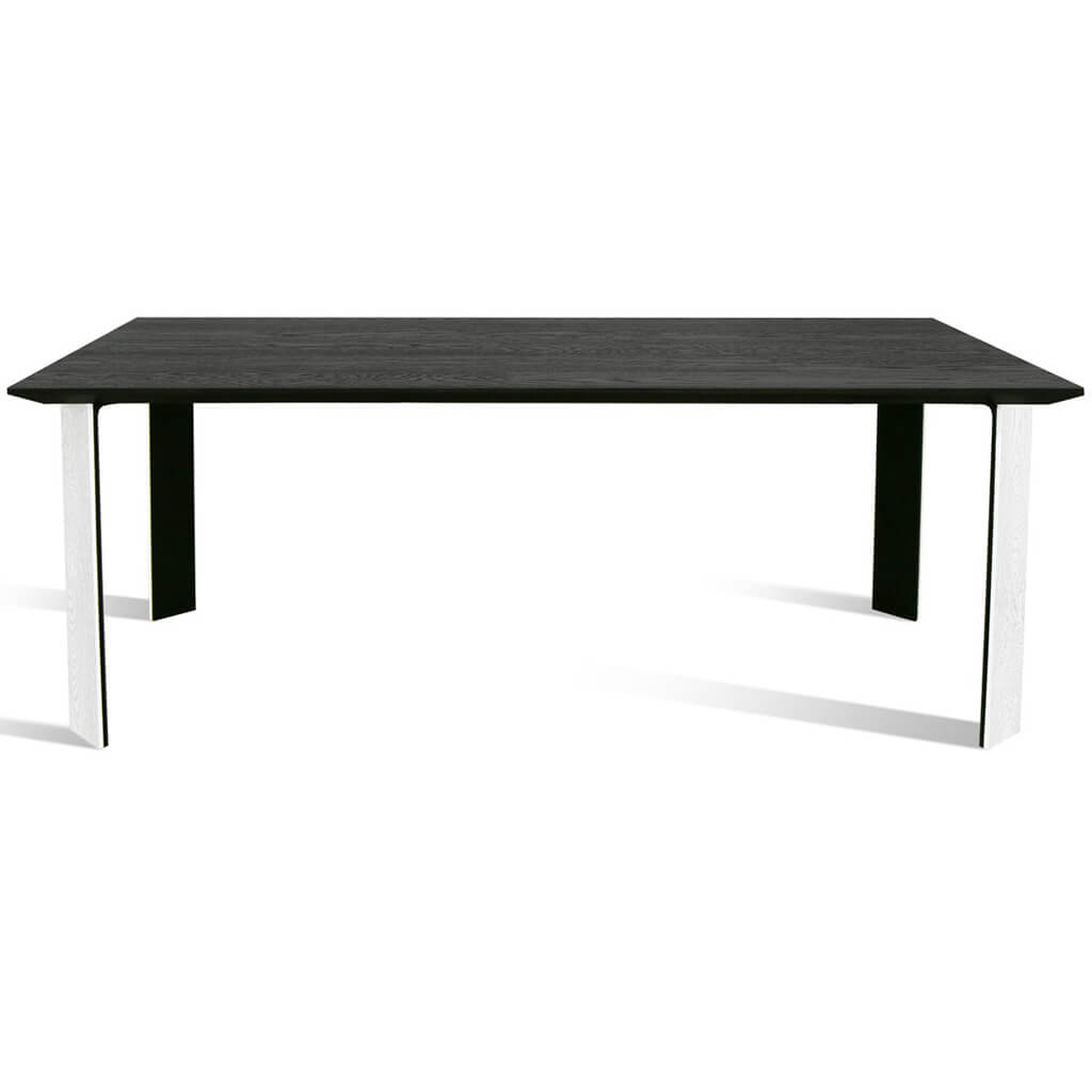 Maxima House Kasako-BW Dining Table featuring a black tabletop and white legs, showcasing a modern and elegant design.