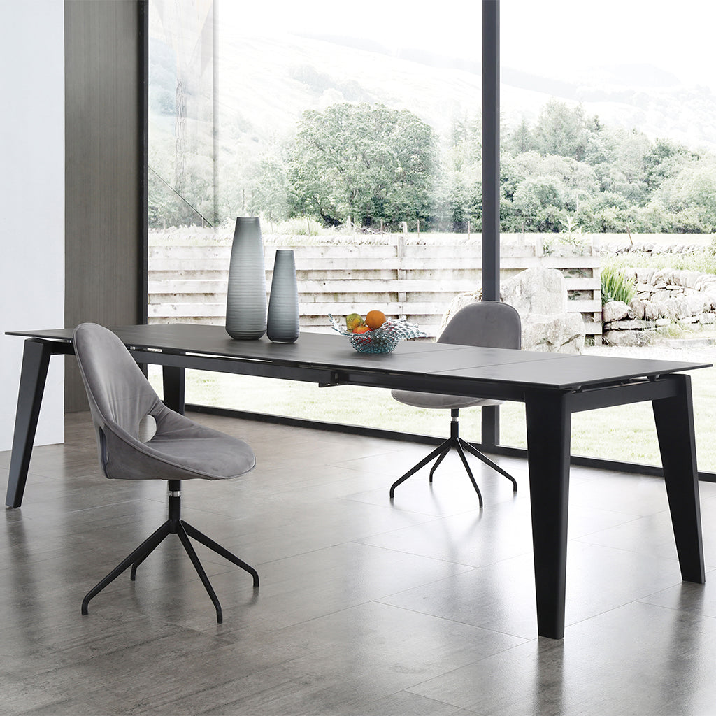 Theo | 10 Seater Dining Table, Adjustable Dining Table, Rectangular, Glass & Ceramic Top, Birch Wood Legs, DT1718-BLK Size: 71inW x 39inD x 30inH; Extended: 110inW x 39inD x 30inH Weight: 152lb; Shape: Rectangular Material: Top: Glass & Ceramic; Legs: Birch Wood Seating Capacity: Seats 8-10 people; Color: Black Color