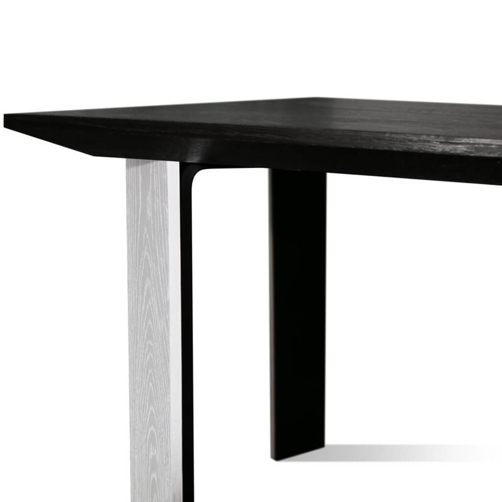 Maxima House Kasako-BW Dining Table featuring a black tabletop and white legs, showcasing a modern and elegant design.