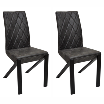 Leather lounge chairs with foam-padded seats and uniquely shaped metal legs